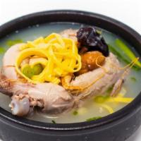 Sam Gye Tang · Whole young chicken soup stuffed with ginseng and rice.