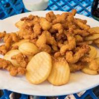 Fried Clam Strips And Chipps · Clam strips w/ chipps and tartar.