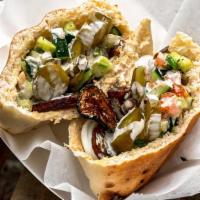Ba'Al · Grilled zucchini, humus, shepherd salad, hard-boiled egg.