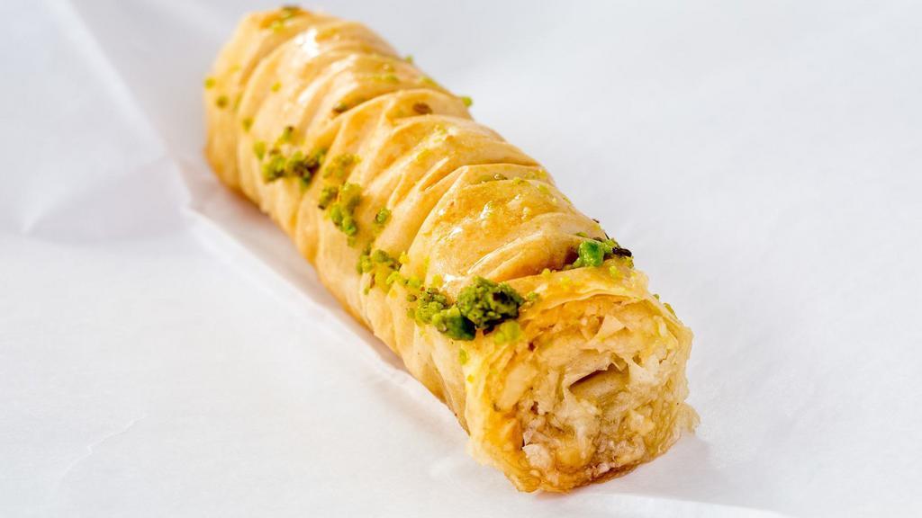 Baklava · Middle Eastern dessert pastry made of layers of filo filled with butter cream and pistachio.
Turkish mussel shape style.