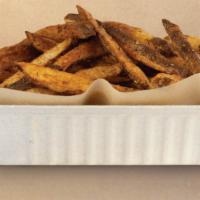 Cajun Fries · Hand cut fries tossed in our signature cajun seasoning