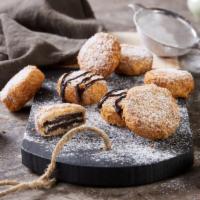Fried Oreos · Six pieces classic Oreos battered then deep-fried to perfection.