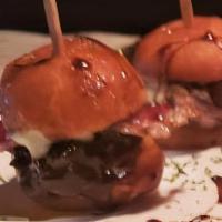 Grill Steak Munchkins · 4 Munchkins Doughnut Stuffed with braised pork topped with Crispy Bacon and Glazed with Smok...