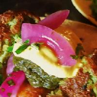 Mediterreanean Tacos · Falafel stuffed with goat cheese & feta cheese, yellow creamy Chili Sauce, pickled Onion ove...
