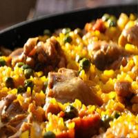 Chicken & Chorizo  Paella · Saffron Rice, Green Peas, Peppers, Chicken & Chorizo