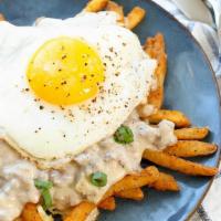 3 Eggs On A Plate With Cheese Fries · 3 Eggs on a plate with Cheese Fries - free coffee 
Eggs will be fried unless specified.   Of...