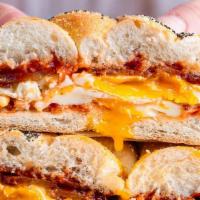 Bacon, Eggs & Cheese On A Roll W/ Coffee · Bacon 2 Eggs and Cheese on a roll with coffee
SPK no side