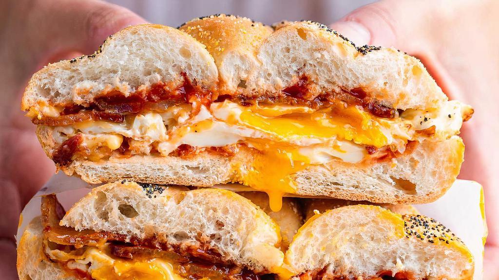 Bacon, Eggs & Cheese On A Roll W/ Coffee · Bacon 2 Eggs and Cheese on a roll with coffee
SPK no side
