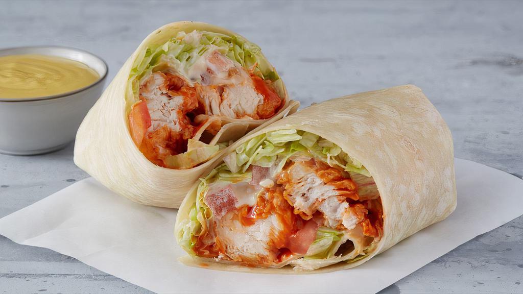 Buffalo Chicken Wrap · Grilled or Fried Chicken, Served with Lettuce, Tomato, Blue Cheese and your Favorite Flavor! 480-1,142 cal.