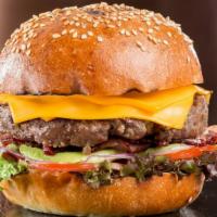 100% Beef Burger · Delicious 100% Ground Beef Burger freshly prepared and cooked to perfection. Topped with let...