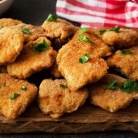 Chicken Nuggets (9 Pieces) · Delicious chicken nuggets fried to perfection.