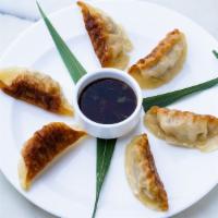 6 Piece Pork Gyoza · Pan-seared or steamed pork dumpling with chili soy sauce.