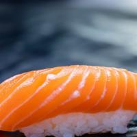 1 Piece King Salmon · Your choice of sliced fish served over rice (sushi) or sliced fish served without rice (sash...