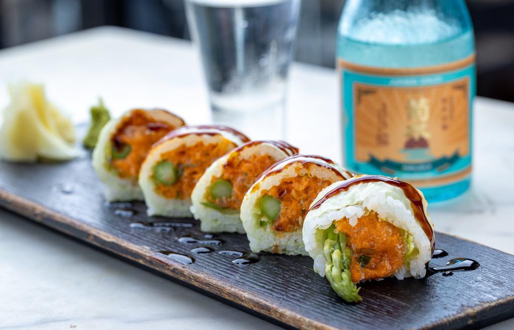Greenwich Roll · Spicy yellowtail, jalapeno, cilantro, tempura crunchy and asparagus with spicy eel sauce.