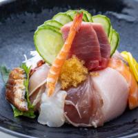 Chirashi Lunch Special · Ten pieces of sashimi selection over sushi rice. Choice of miso soup or salad.