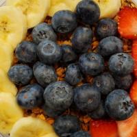 Berry Acai Bowl · Blended with acai, banana, strawberries and blueberries and topped with granola, banana, str...