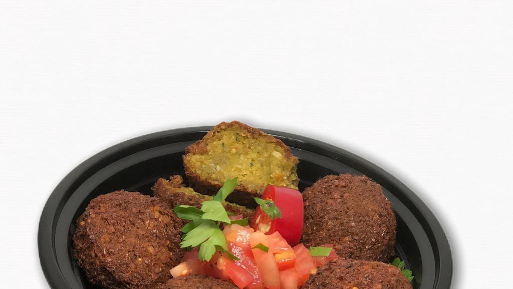 Spicy Falafel · Spicy. Made with chickpeas, onions, cumin, spicy hot peppers and parsley.