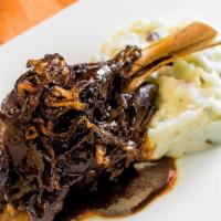  - Lamb Shank · Dressed with Armagnac prune sauce served over red skin mashed potatoes and caramelized onions.
