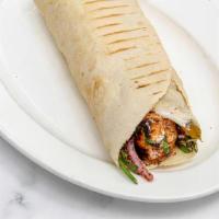  - Shish Tawook Pita Sandwich (Chicken Kebab) · Char-grilled chicken breast cubes, garlic toum, onions ＆ parsley sumac mix, pickles, and fri...