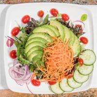 Avocado · With mixed greens, carrots, red onions, tomatoes, and lemon vinaigrette dressing.