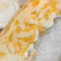 Salmon Burrito  · with mixed cheese, corn, lettuce, onions