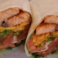 Salmon Wrap · Grilled salmon with lettuce, tomato, mango and chipotle mayo on a flour tortilla.