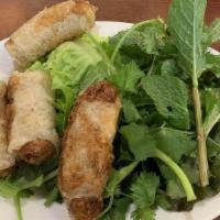 Vietnamese Crispy Spring Roll · Deep fried rolls wrapped in rice paper with a mixture of ground pork, chicken, black mushroo...