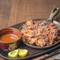 Pulled Pork · Dry rubbed, slow smoked pork shoulder shredded and tossed with our Tangy Apple BBQ Sauce.