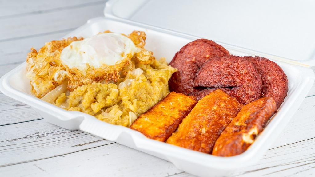 Mangu Con Salami, Queso Frito Y Huevo · Mashed plantains, fried salami, fried cheese and fried eggs.