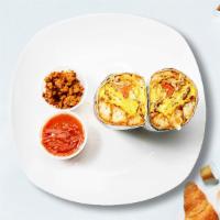 Proper Pastrami Breakfast Burrito · Pastrami, eggs, tater tots, cheddar cheese, tomatoes and caramelized onions wrapped in a flo...