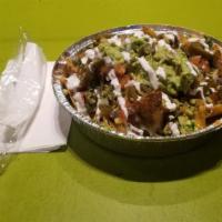 Nachos · Corn tortillas topped with melted mixed cheese, guacamole, sour cream, oaxacan black beans, ...