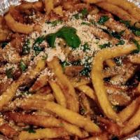Btc Papas Fritas · Hand cut fries topped with cotija cheese, cilantro, BTC chilli powder served with chipotle m...