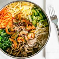 Bibimbap - Vegetarian · Mixed rice with vegetables served with cucumber kimchi.