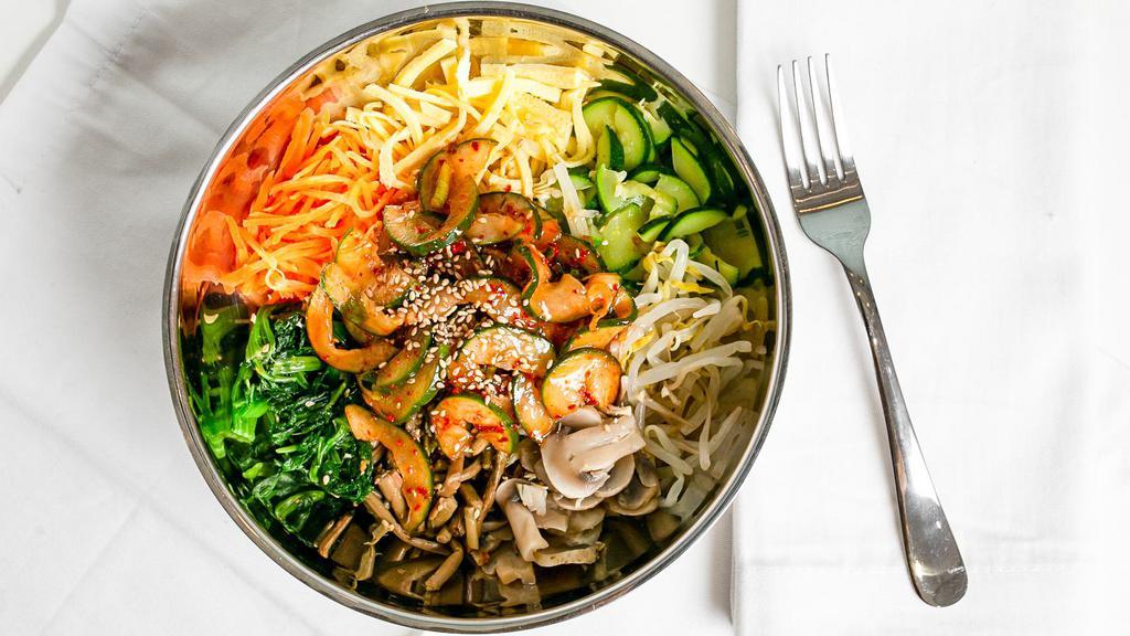 Bibimbap - Vegetarian · Mixed rice with vegetables served with cucumber kimchi.