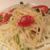Green Papaya Salad · Spicy. Tomato, peanuts, string beans and fresh lime juice. Mildly spicy.