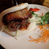 Crispy Duck Buns · Spicy. Scallion, cucumber and house-made hoisin. Mildly spicy.