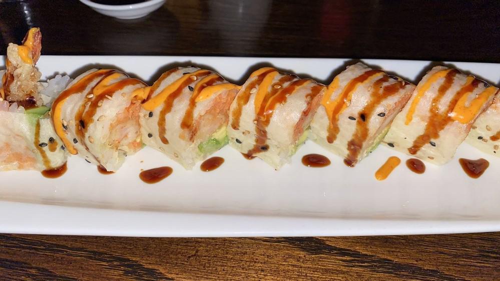 Hot Lover Roll · Spicy. Shrimp tempura, spicy tuna, avocado, crunch, and kabayaki sauce, gochujang mayo in sesame crepe. Mildly spicy.