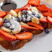 Challah French Toast · Favorite. Served with seasonal berries and bananas.