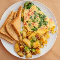 Goat Cheese Omelette · Spinach and tomato - serves with two sides.
