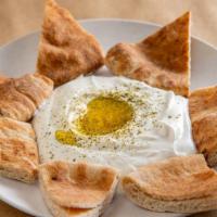 Labneh · Served with whole wheat pita.
