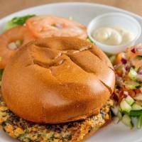 Veggie Burger · Homemade veggie burger (carrot, zucchini, sweet potato, spinach)
served with a side lettuce,...