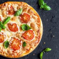 Fresh Mozzarella Pizza · Fresh and delicious mozzarella cheese, tomatoes, fresh basil, herbs and olive oil.