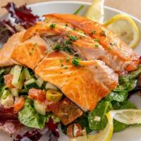 Grilled Asian Sesame Salmon Salad · Spinach, Tomato, Cucumber,  Olive, Feta, Sesame Seeds with Asian Sesame Dressing
