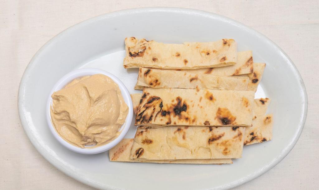 Hummus · Served with homemade flatbread.