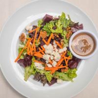 Roasted Beet & Goat Cheese Salad · Mesclun field greens, julienne carrots, candied walnuts and dried cranberries with a balsami...