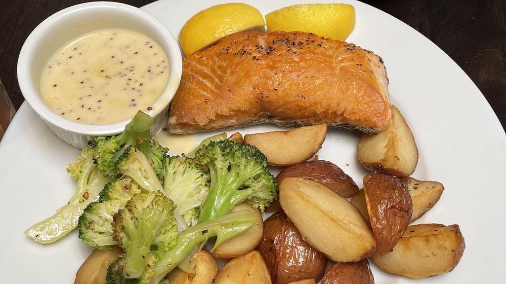 Pan-Seared Salmon · Served with red bliss potatoes and vegetable of the day.