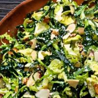 Kale & Shaved Brussels Sprouts (Half Pint) · with parmesan & almonds