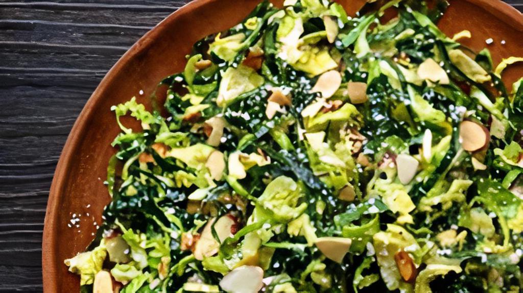 Kale & Shaved Brussels Sprouts (Half Pint) · with parmesan & almonds
