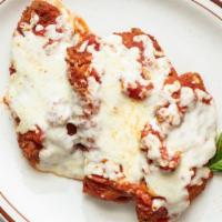 Chicken Parmigiana · Can be made gluten free. Breaded in our gluten free breading, seared and covered in our mari...