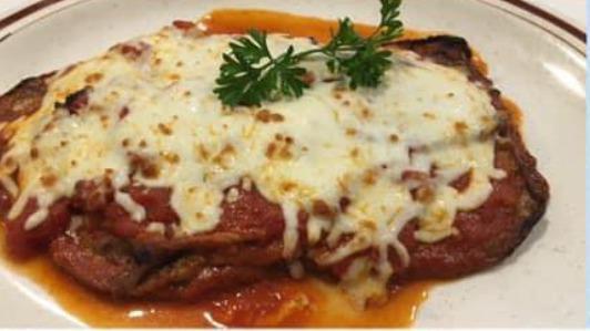 Veal Parmigiana · Can be made gluten free. Thinly sliced veal breaded and seared baked with marinara sauce and melted mozzarella cheese.